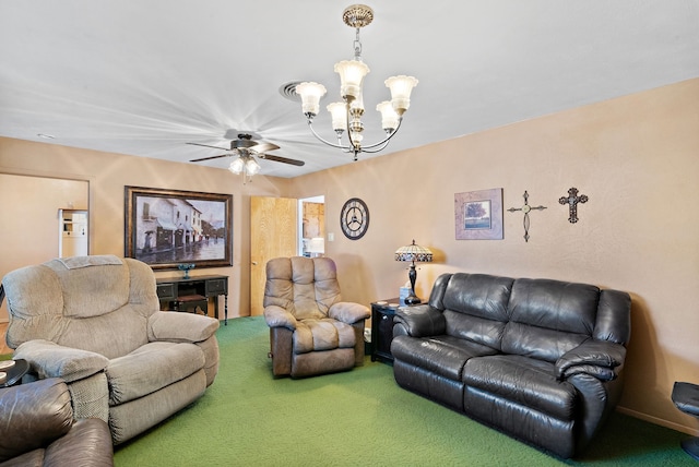 living room with ceiling fan with notable chandelier and carpet flooring