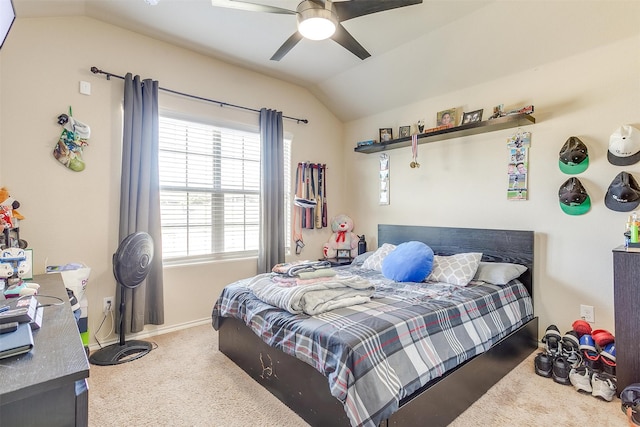 bedroom with lofted ceiling, carpet, and ceiling fan