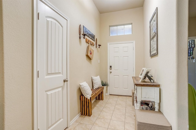 doorway featuring light tile patterned floors