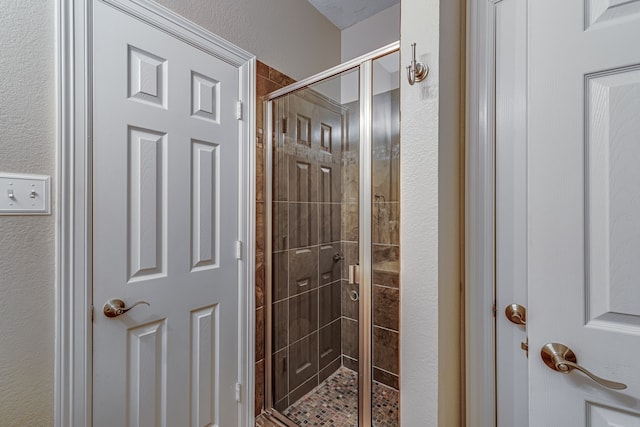 bathroom featuring walk in shower