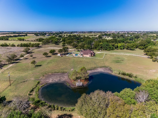 drone / aerial view with a water view and a rural view