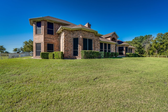 exterior space with a lawn