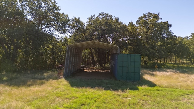 view of outbuilding featuring a carport