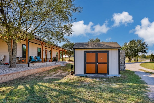 view of outdoor structure with a yard