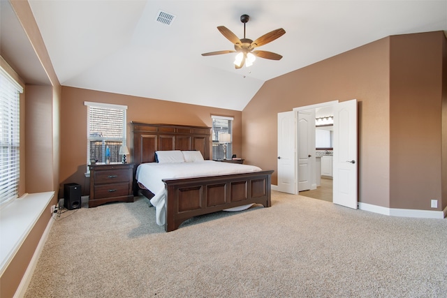 carpeted bedroom with lofted ceiling and ceiling fan