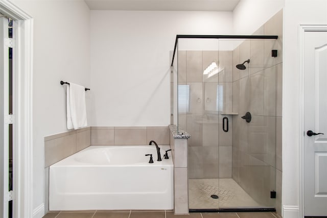 bathroom with plus walk in shower and tile patterned floors