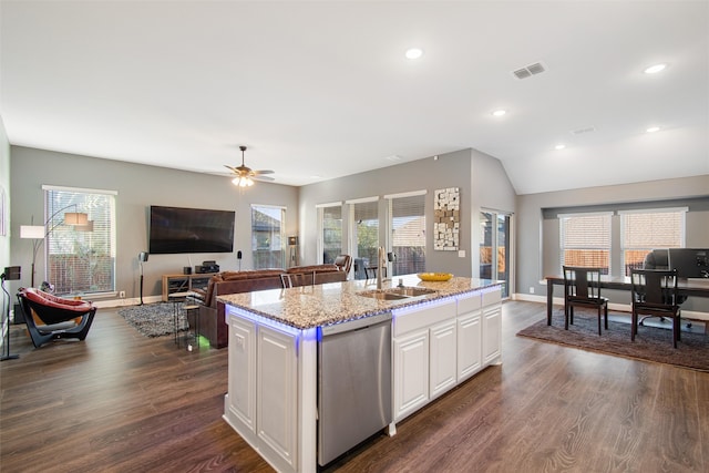 kitchen with dishwasher, white cabinets, a center island with sink, and dark wood-type flooring