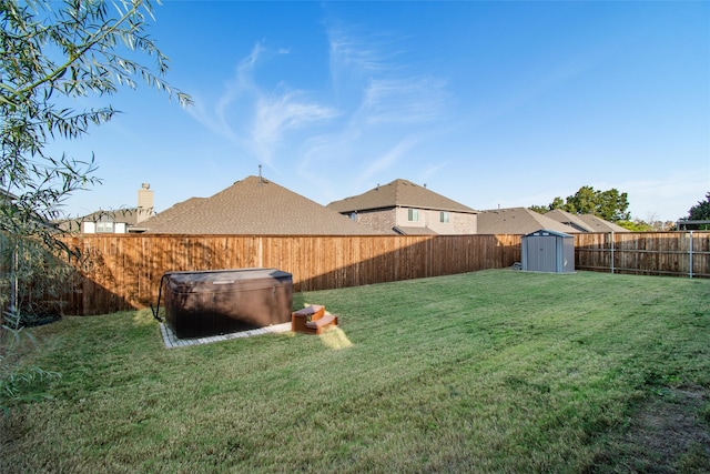 view of yard with a storage unit