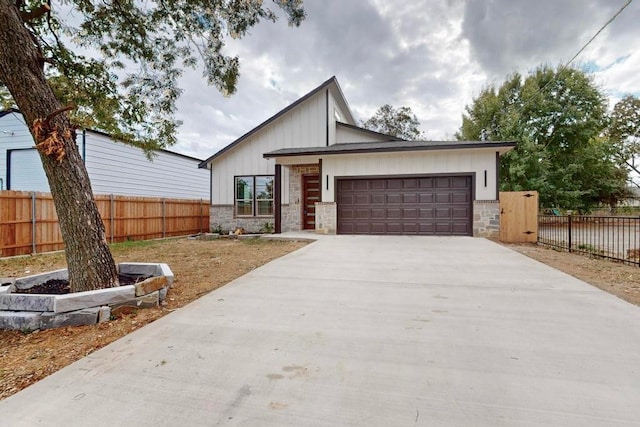 view of front of property with a garage