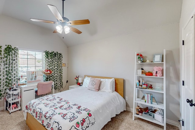 bedroom with lofted ceiling, ceiling fan, and light colored carpet