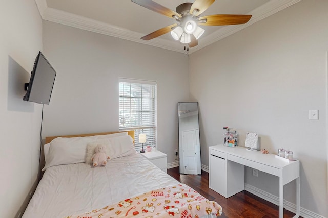 bedroom with ornamental molding, ceiling fan, and dark wood-type flooring