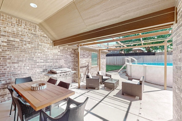 view of patio / terrace with an outdoor hangout area and a fenced in pool