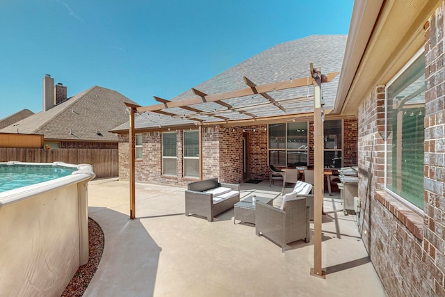 view of patio / terrace with a pergola, a fenced in pool, and an outdoor hangout area