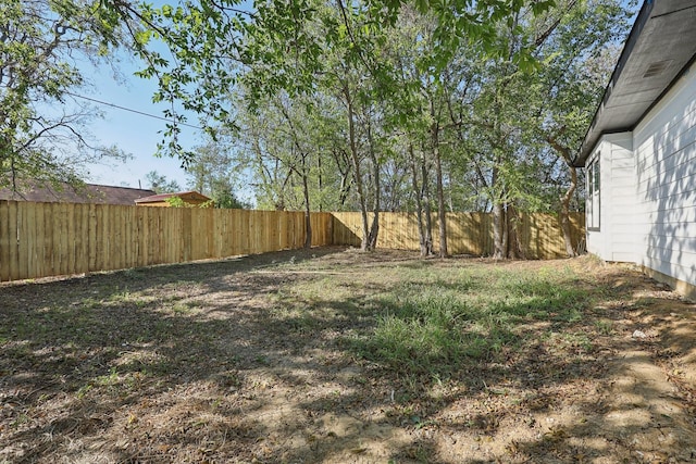 view of yard featuring a fenced backyard