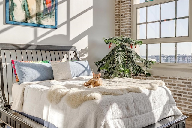 2600 W 7th St Unit 2746, Fort Worth, TX 76107 - bedroom with brick wall and a view of city