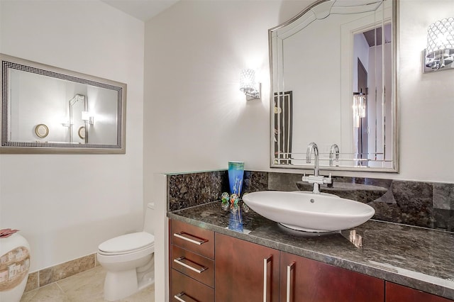 2600 W 7th St Unit 2746, Fort Worth, TX 76107 - bathroom featuring toilet, vanity, and tile patterned floors