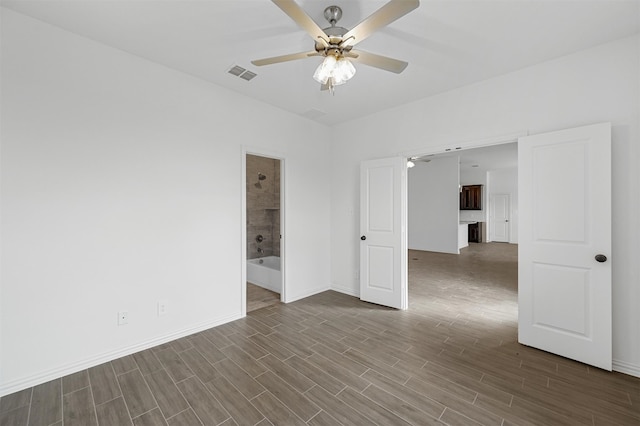 unfurnished room featuring hardwood / wood-style flooring and ceiling fan