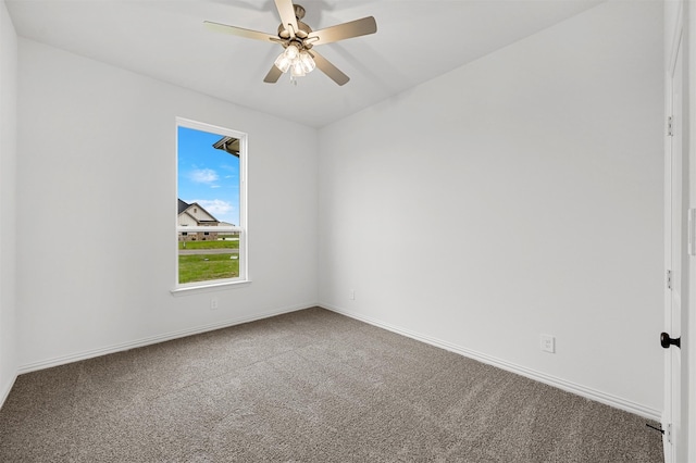 carpeted empty room with ceiling fan