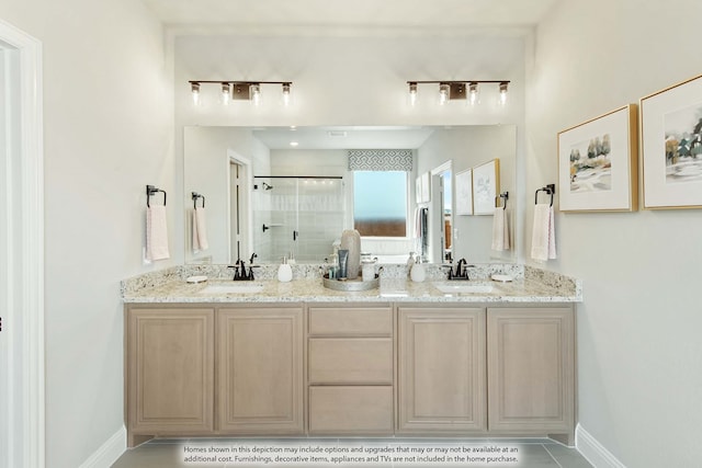 bathroom with walk in shower, vanity, and track lighting