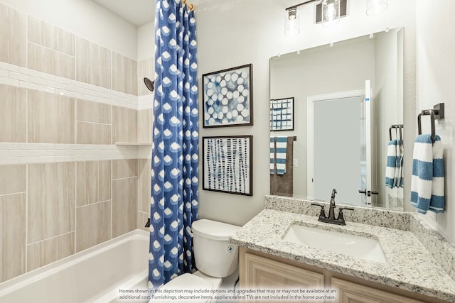 full bathroom featuring shower / bath combo, vanity, and toilet