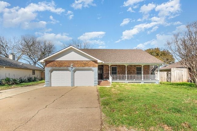 single story home with brick siding, a porch, concrete driveway, a front yard, and a garage