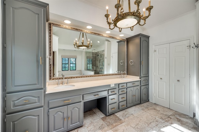 bathroom featuring crown molding, vanity, a chandelier, and an enclosed shower