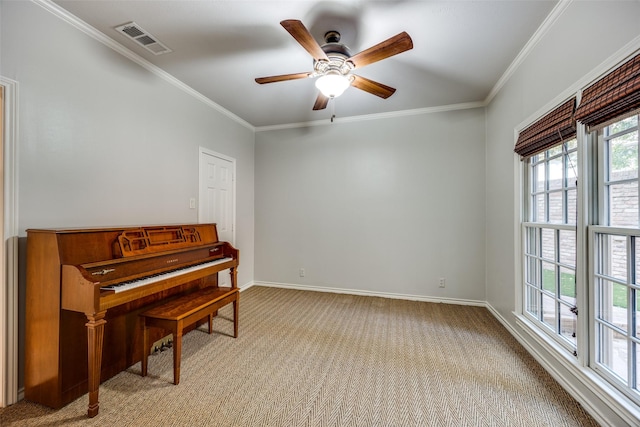 miscellaneous room with light carpet, crown molding, and ceiling fan