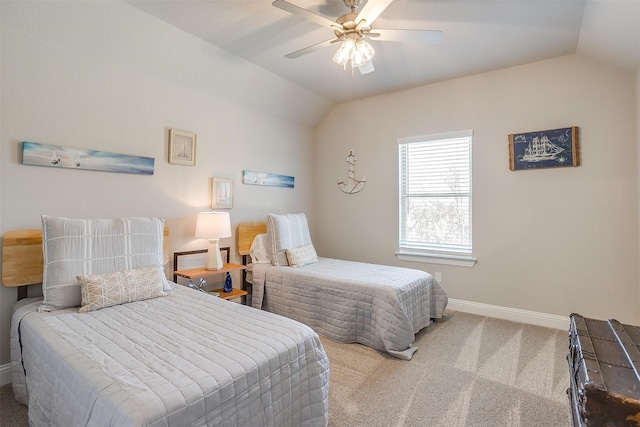 bedroom featuring carpet, vaulted ceiling, and ceiling fan