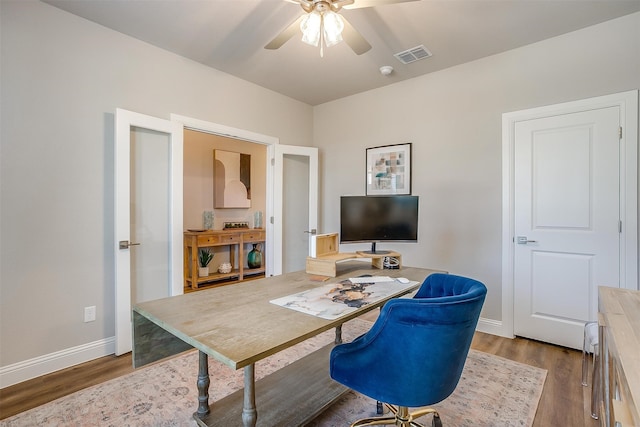 office space featuring ceiling fan and hardwood / wood-style floors