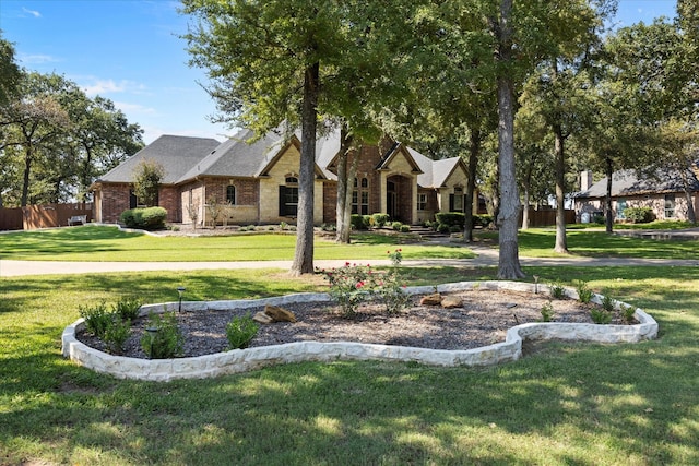 view of front of home with a front yard