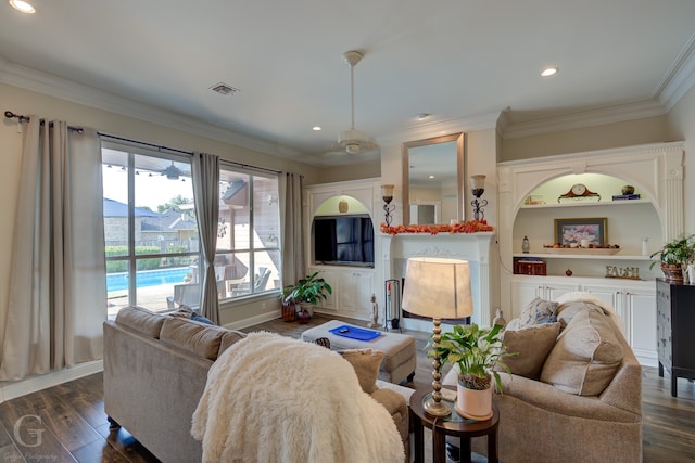 living room with dark hardwood / wood-style floors and crown molding