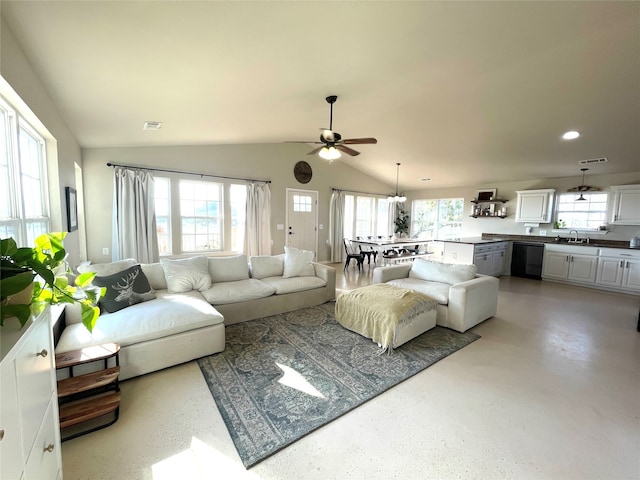 living room with lofted ceiling, sink, ceiling fan, and a wealth of natural light