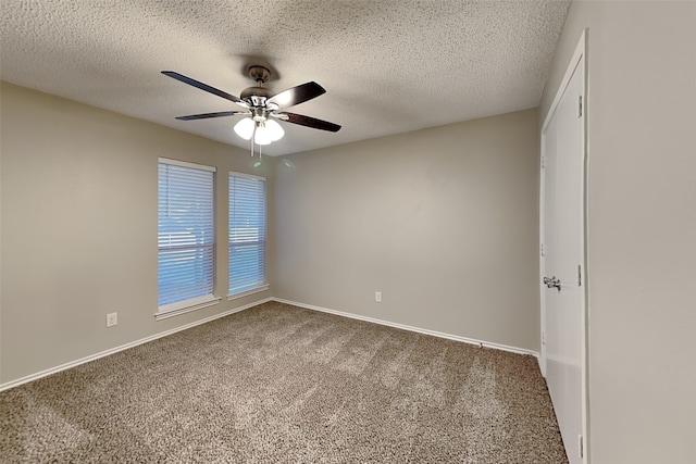 unfurnished bedroom featuring ceiling fan, a textured ceiling, and carpet