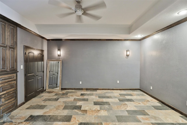 unfurnished room featuring crown molding and ceiling fan