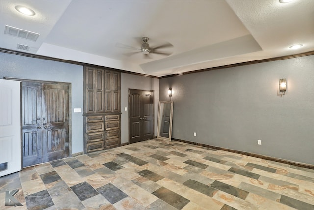 unfurnished bedroom with ceiling fan and crown molding