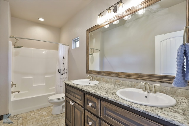 full bathroom with shower / bath combo, vanity, tile patterned flooring, and toilet