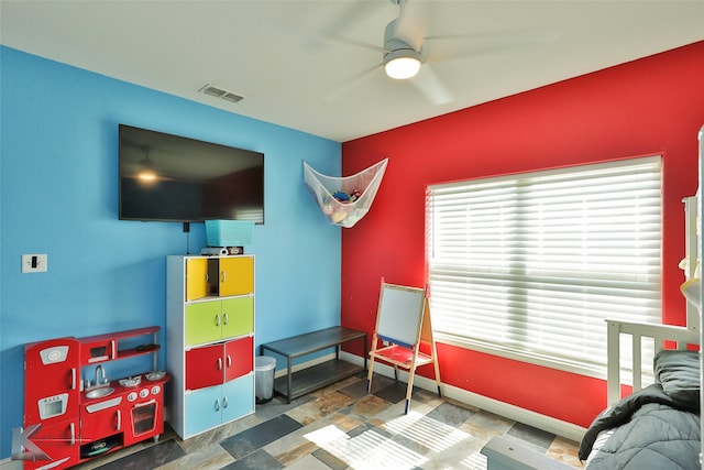 recreation room with ceiling fan