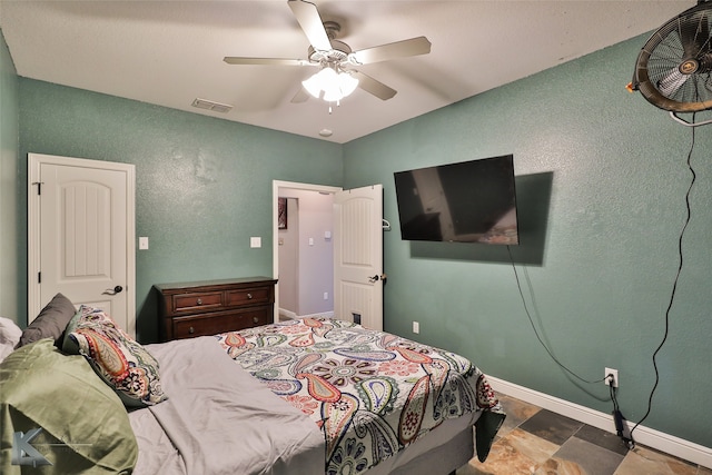 bedroom featuring ceiling fan