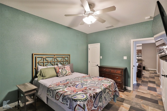 bedroom featuring ceiling fan