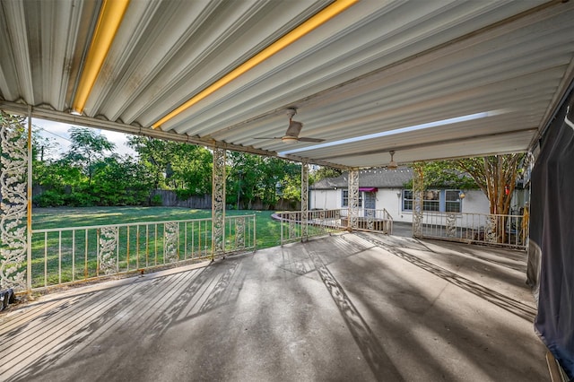 view of patio with a storage unit and ceiling fan