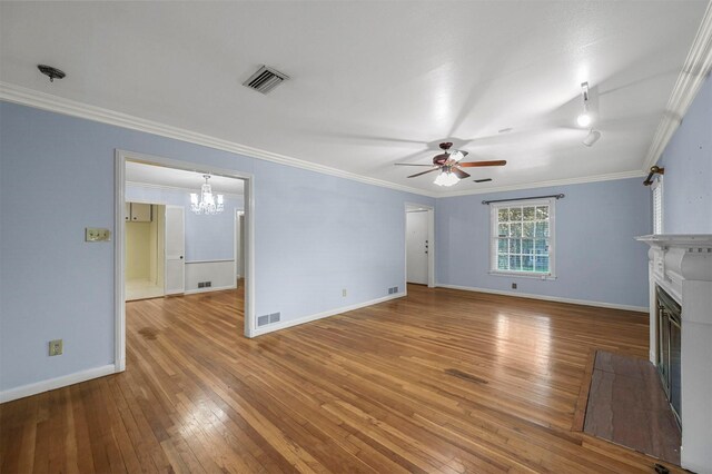 unfurnished living room with ceiling fan, crown molding, and light hardwood / wood-style flooring