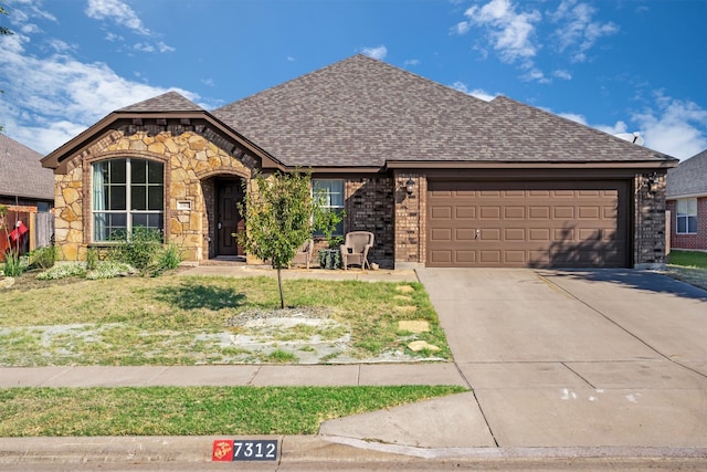 view of front of property featuring a garage