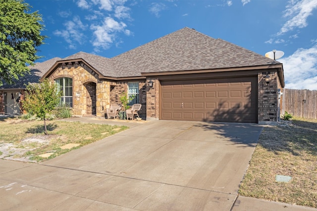 view of front of home with a garage