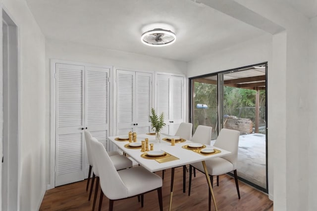 dining area featuring dark hardwood / wood-style floors