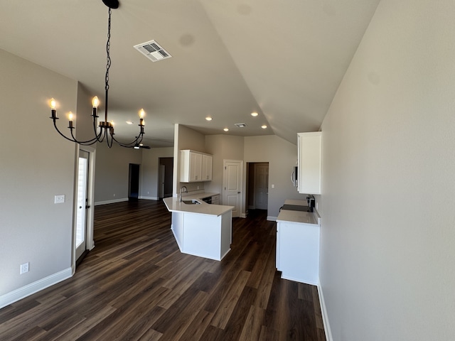 5793 Bunker Way, Blanchard, LA 71107 - kitchen featuring dark wood-style flooring, a sink, visible vents, baseboards, and white cabinets