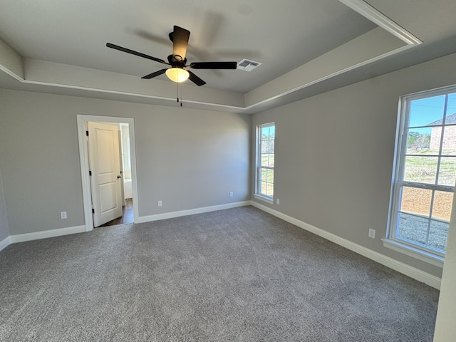5793 Bunker Way, Blanchard, LA 71107 - spare room featuring baseboards, visible vents, a raised ceiling, and carpet flooring