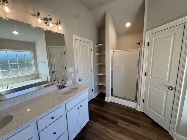 5793 Bunker Way, Blanchard, LA 71107 - full bathroom featuring double vanity, a stall shower, a sink, and wood finished floors