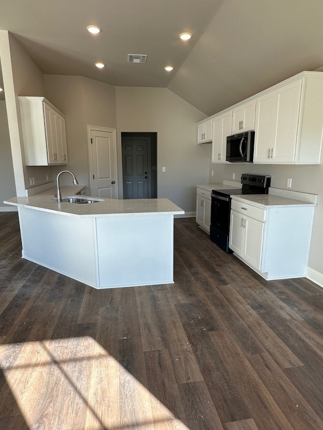 kitchen with white cabinets, sink, black / electric stove, dark hardwood / wood-style flooring, and kitchen peninsula