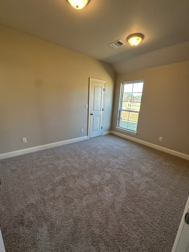 view of carpeted spare room