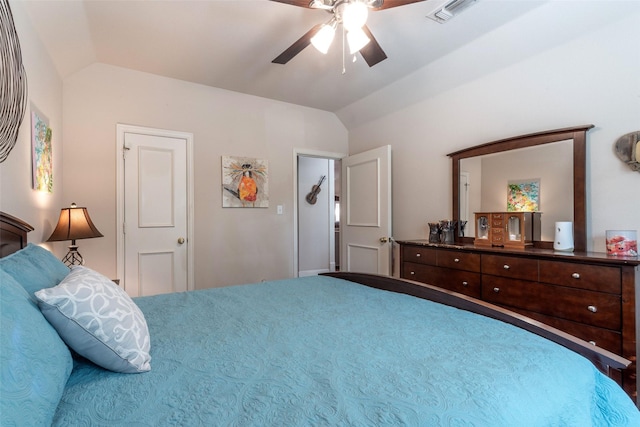 bedroom featuring ceiling fan and lofted ceiling